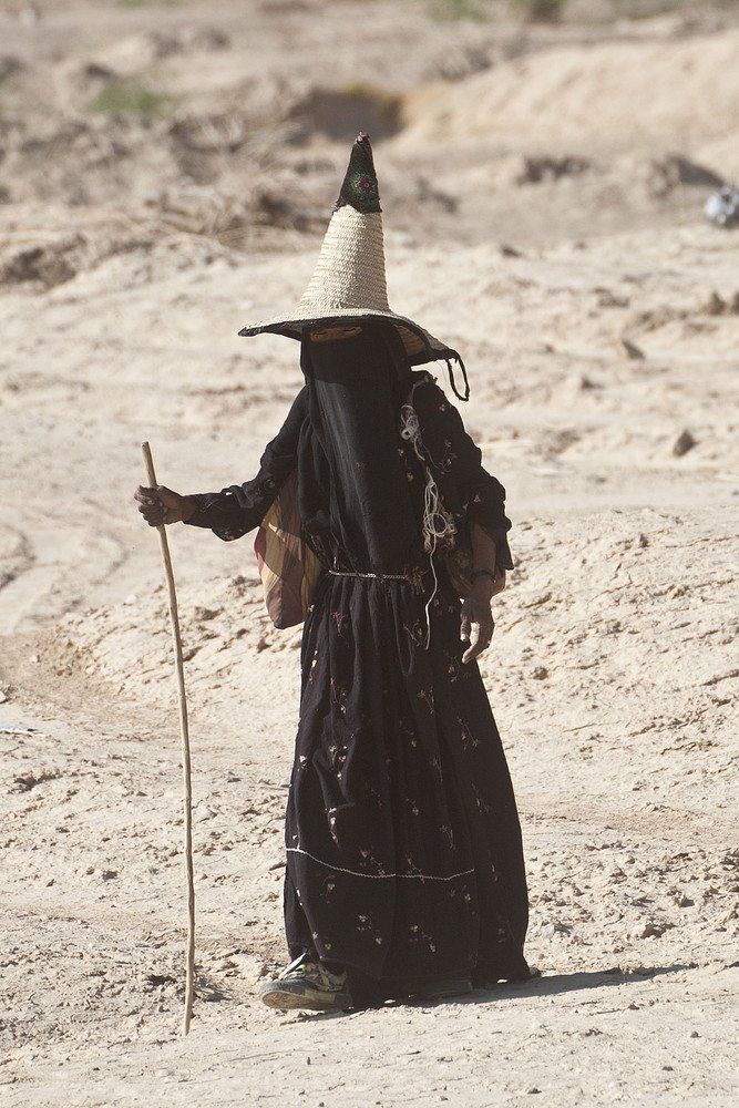 In Yemen, traditional cone hats known as Madhalla are worn by female goat herders to stay cool in the desert heat.