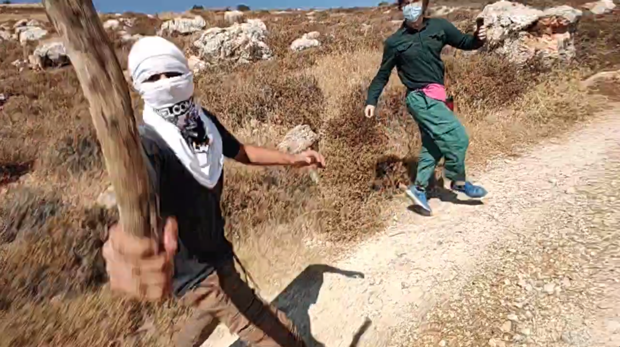 Video: West Bank settlers brutally attack Palestinians and American volunteers day after ICJ rules Israeli occupation illegal