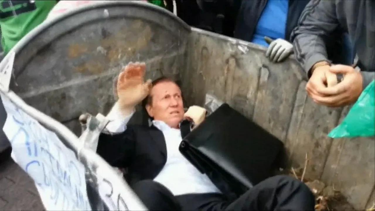 Ukrainian politician thrown into trash (dumpster) - BBC News