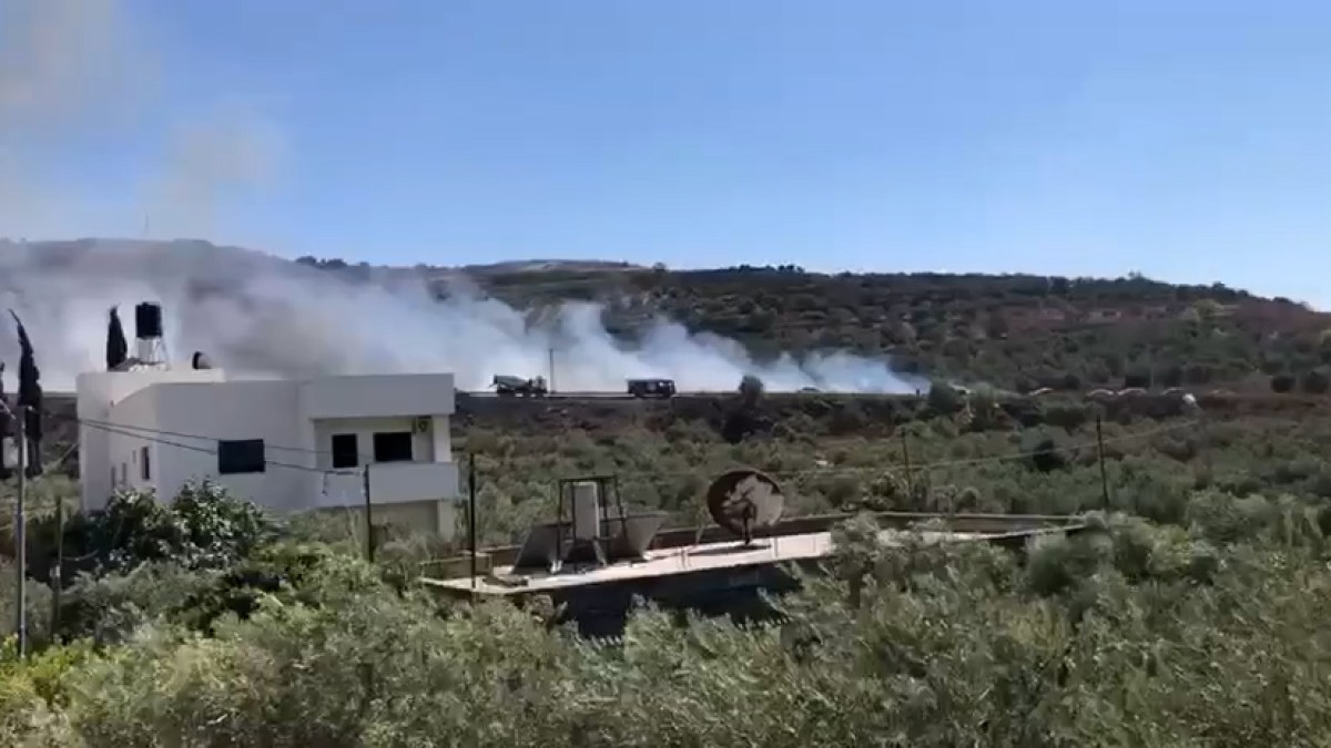 Israeli settlers set fire to olive groves in the occupied West Bank