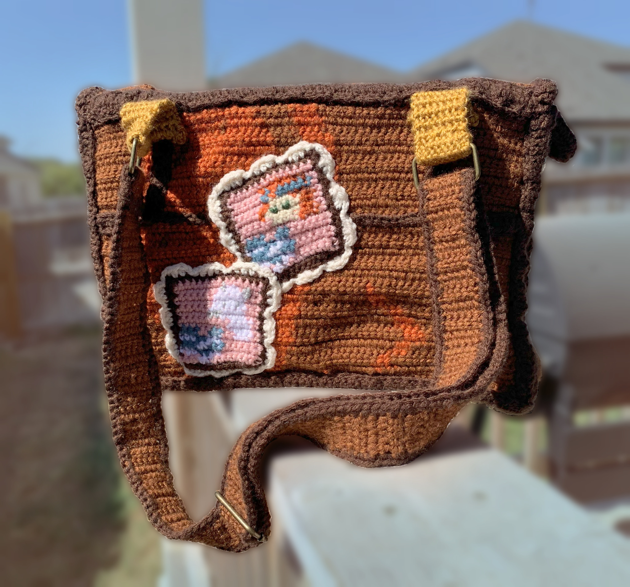 Back side of a bag with crocheted stamps