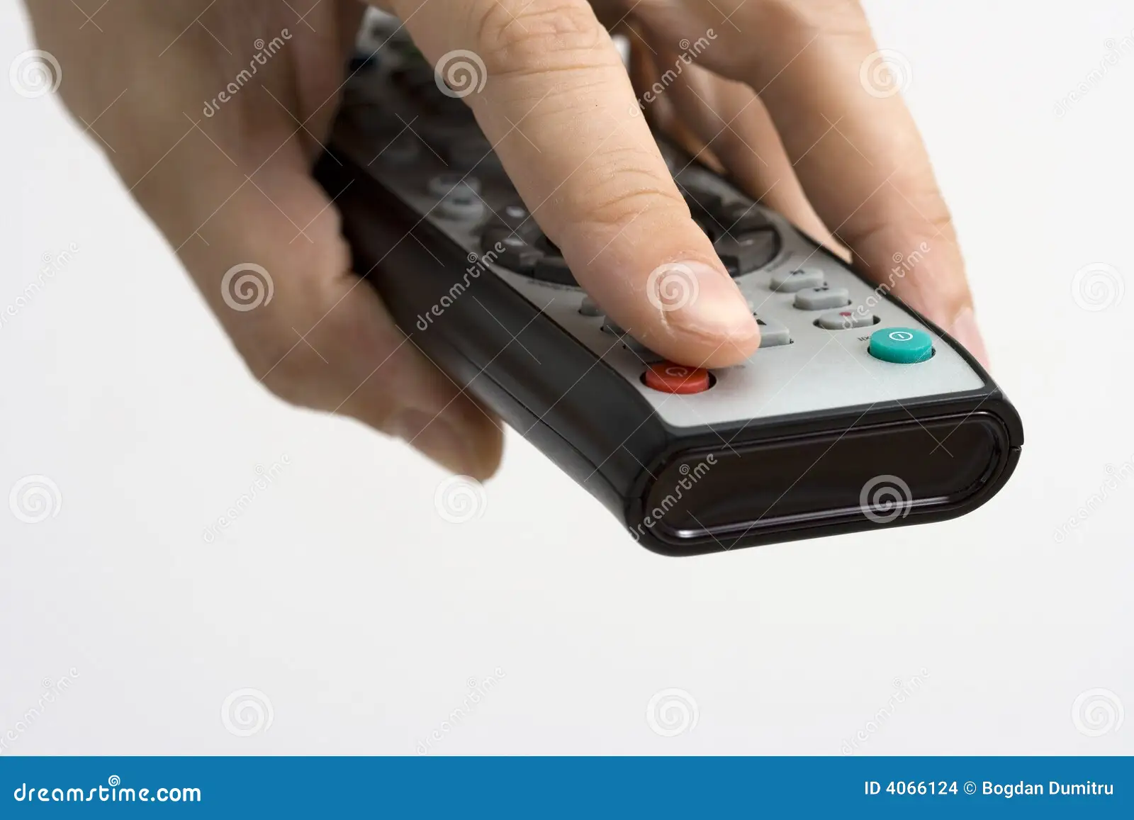 hand pressing off on a remote