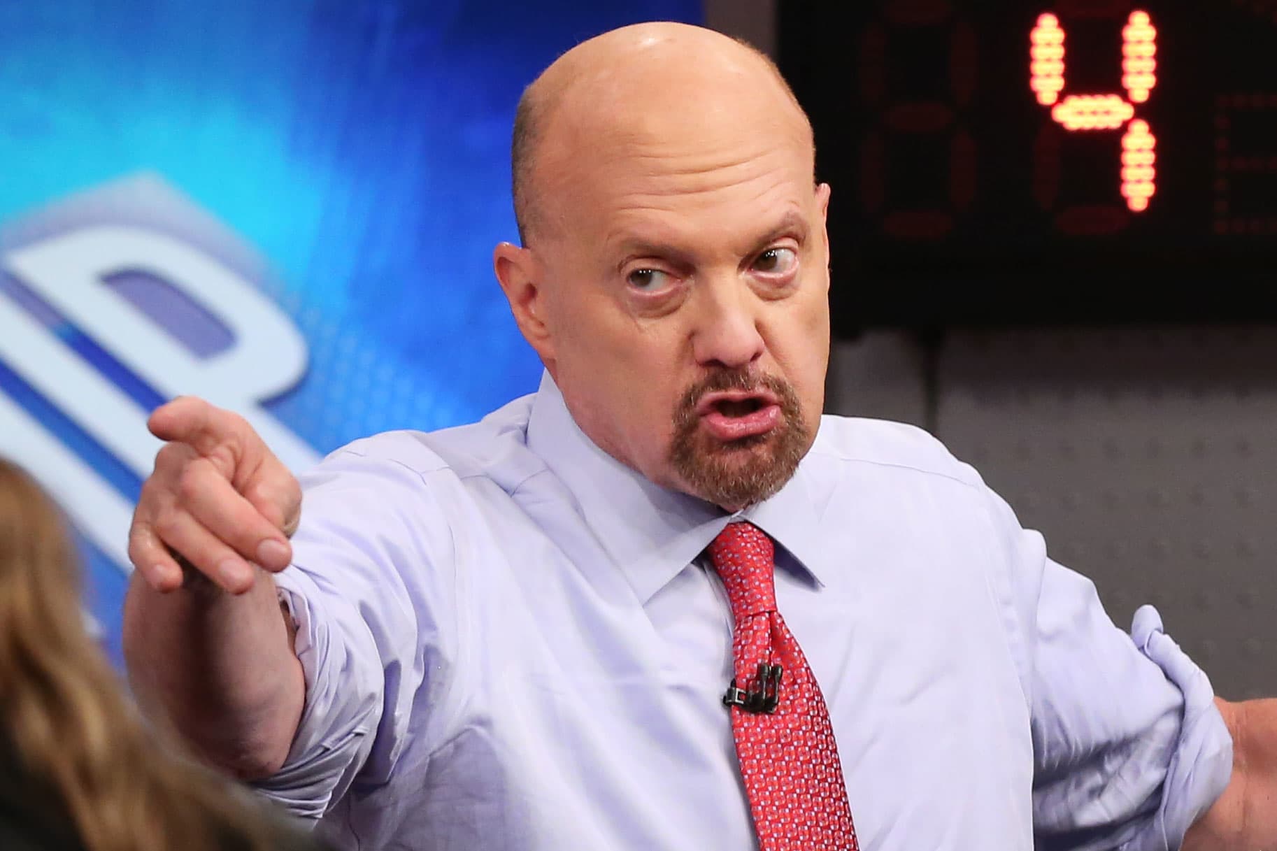 pop culture stock picker Jim Cramer points while looking cranky