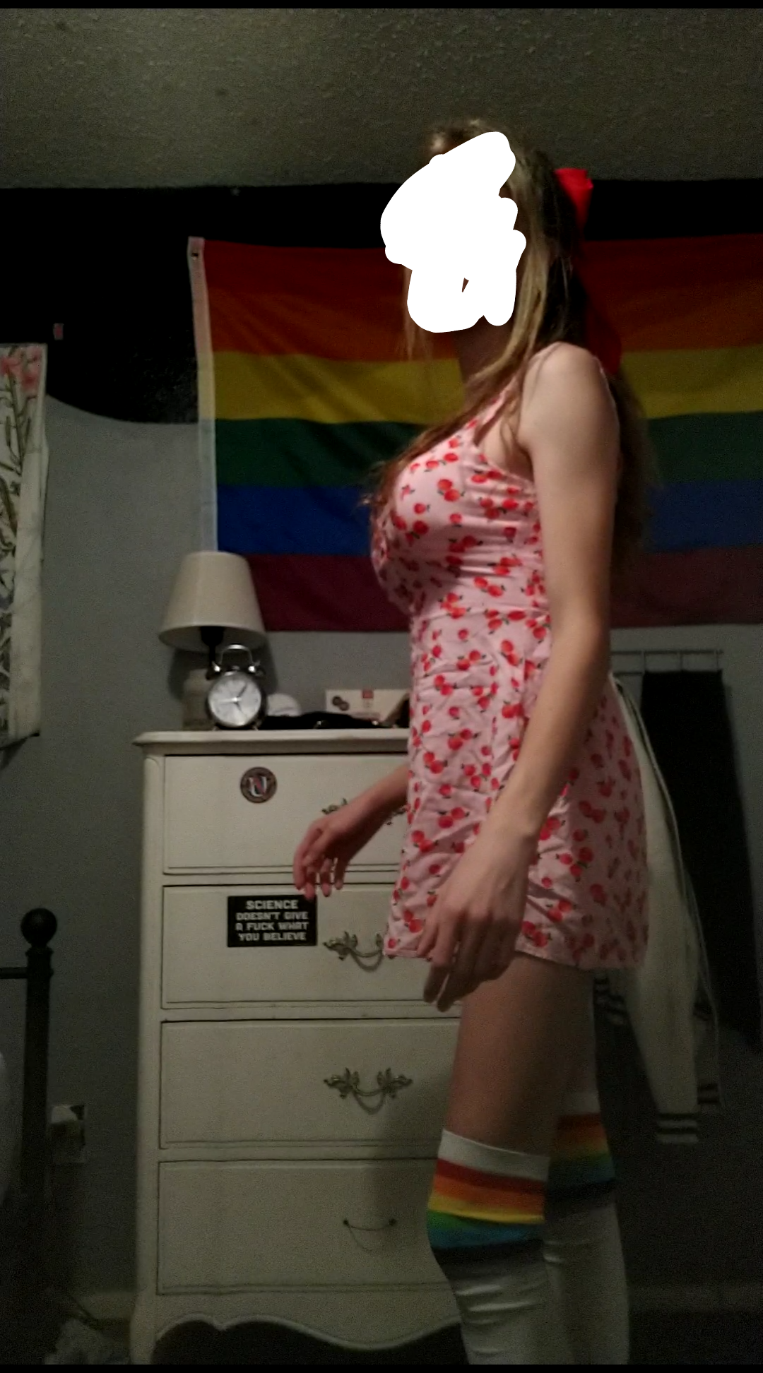 me wearing a pink dress, face blurred