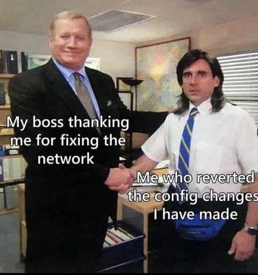 A meme showing two men shaking hands. The man on the left is smiling and appears to be an executive, with the text “My boss thanking me for fixing the network.” The man on the right has a blank expression, messy hair, and is wearing a shirt and tie, with the text “Me who reverted the config changes I have made.” 