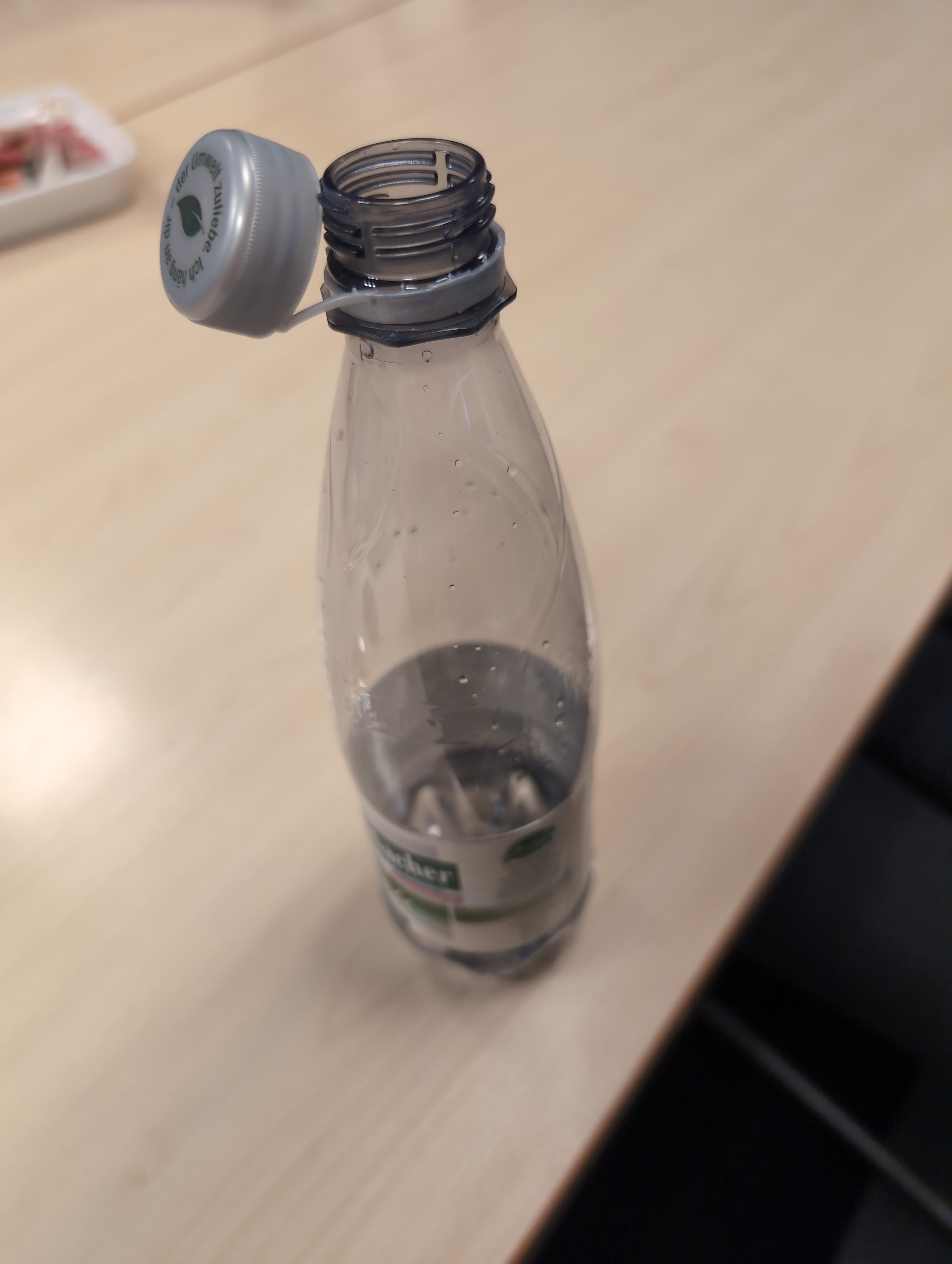 Picture of German water bottle with 'leashed' lid