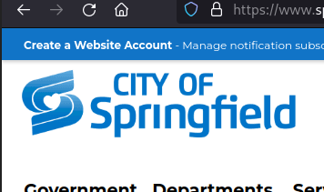 A screenshot of the home page of the website springfieldmo.gov (the official website for Springfield Missouri) showing only the top-left corner of the page (pretty much just the logo and the address bar of the browser showing the url). Just beside the logo it says "City Of Springfield".