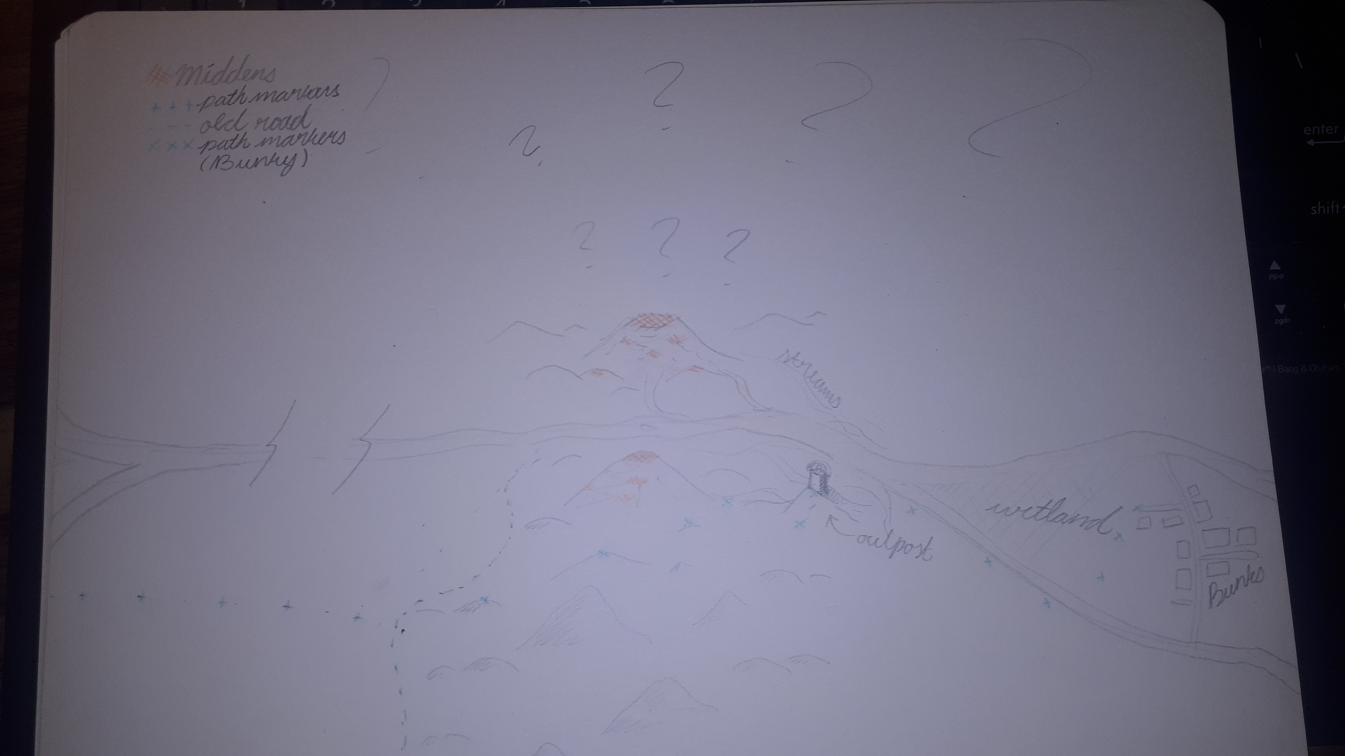 A map of two mountain ranges with orange at their tops, paths going into them from the left, and out at the right, leading to an outpost, and further still some buildings labelled "Bunks." (Please DM me if you would like more detail)